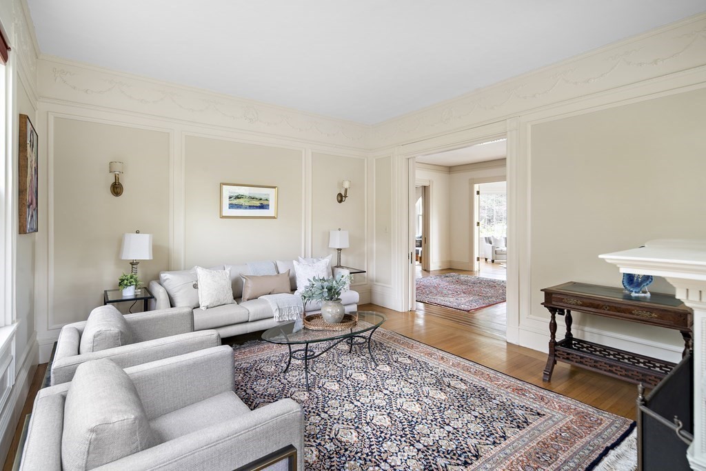 69 Garfield Street Watertown, MA 02472 - Photo 8 of 36 a living room with furniture and a rug