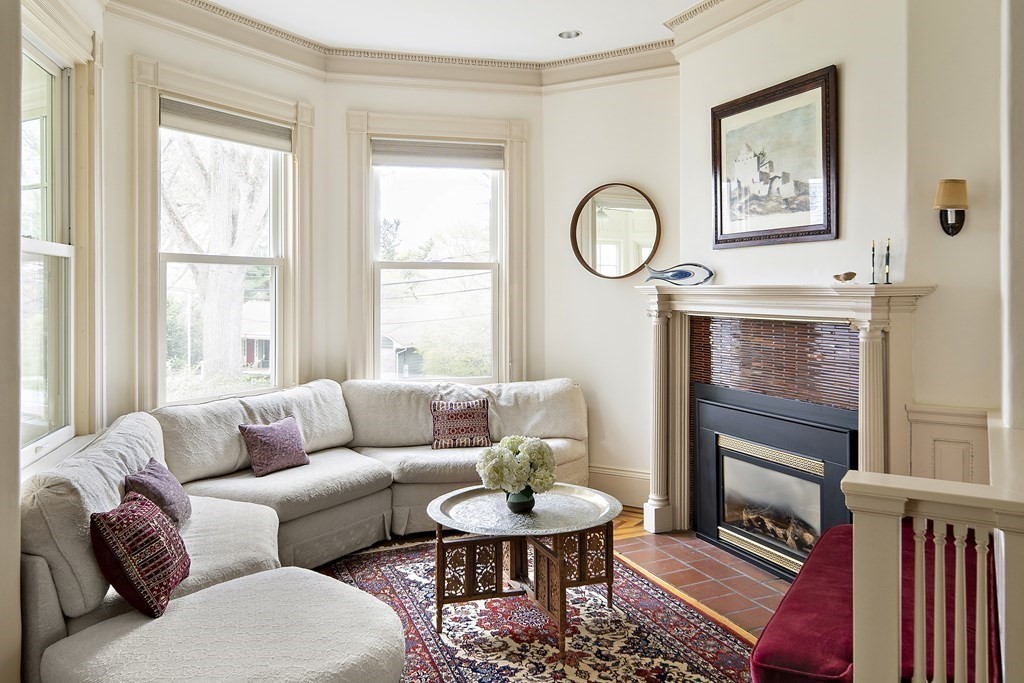 69 Garfield Street Watertown, MA 02472 - Photo 9 of 36 a living room with furniture a rug and a window