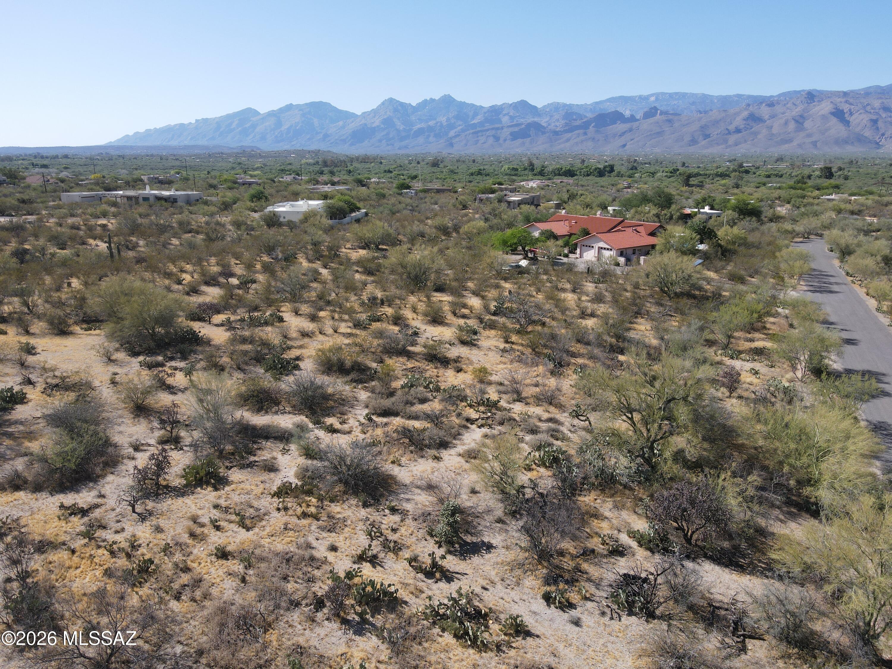 830 North Tanque Verde Loop Road, Unit 8 Tucson, AZ 85748 - Photo 6 of 10 a view of a lush green hillside and houses