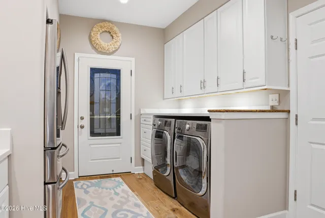 $975,000 | 103 East Point Estates Court, Knotts Island, NC 27950