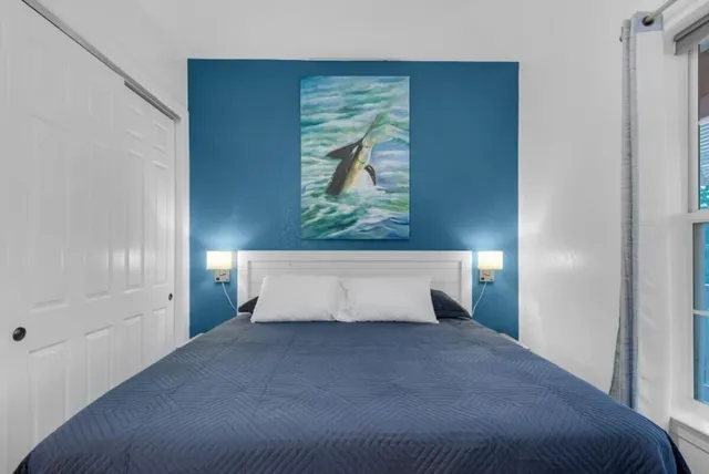 a view of staircase with a rug