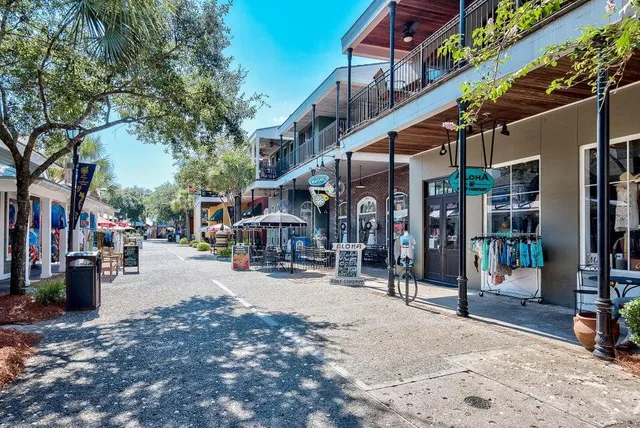 a street view of a building with sitting area