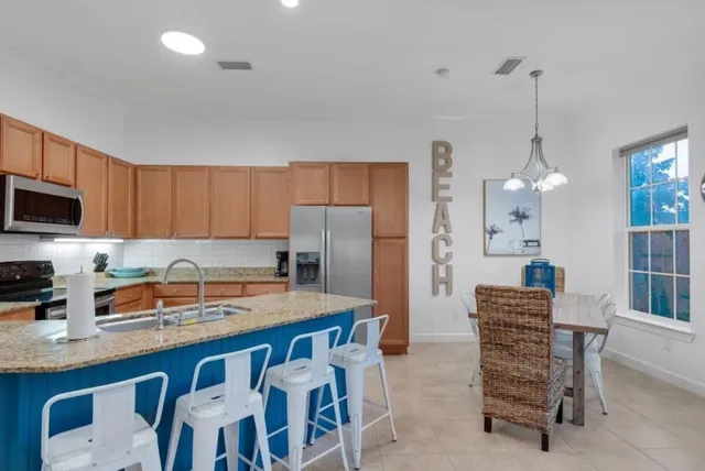 a kitchen that has a cabinets counter space and appliances