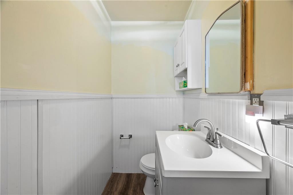 1276 Willowbrook Road Rostraver Township, PA 15012 - Photo 15 of 40 a bathroom with a sink and mirror
