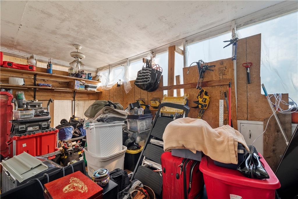 1276 Willowbrook Road Rostraver Township, PA 15012 - Photo 18 of 40 a view of walk in closet with clothes and shoes