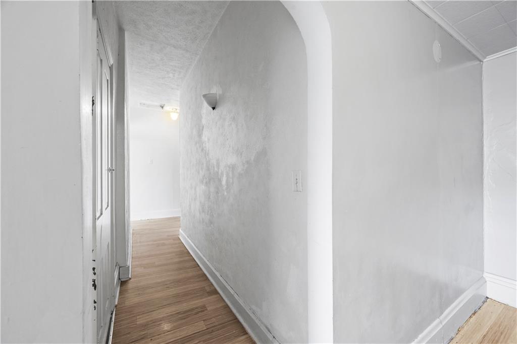 1276 Willowbrook Road Rostraver Township, PA 15012 - Photo 23 of 40 a view of a hallway with wooden floor