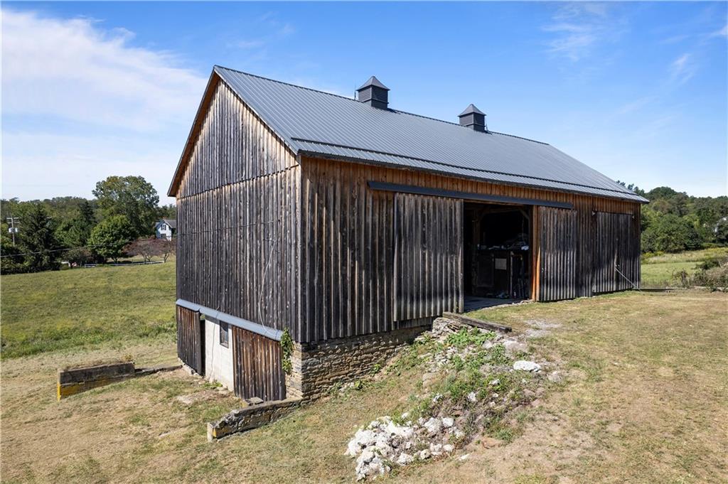1276 Willowbrook Road Rostraver Township, PA 15012 - Photo 26 of 40 a front view of a house with garden