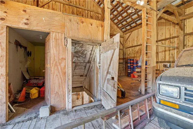 a view of a garage with car parked