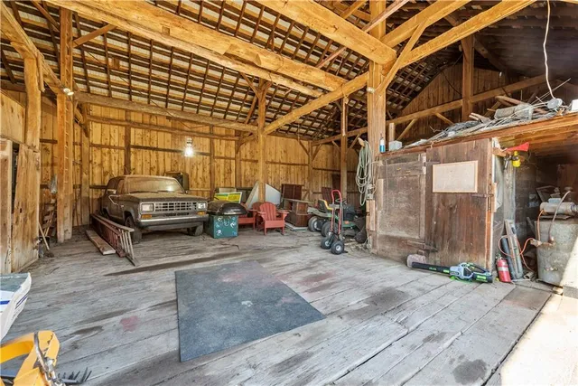 a view of a garage with parked cars