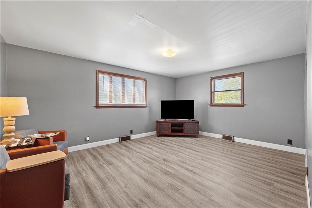 1276 Willowbrook Road Rostraver Township, PA 15012 - Photo 8 of 40 a bedroom with a bed and a flat screen tv