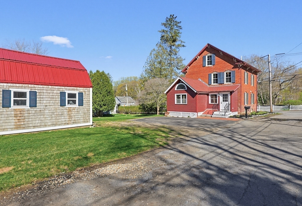 44 Clark Street Spencer, MA 01562 - Photo 27 of 41 a view of a house with a yard