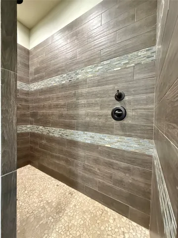 a view of sink and mirror