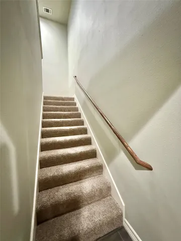 a view of house with garden space and trees