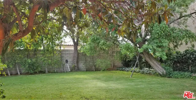 a view of a porch with a yard