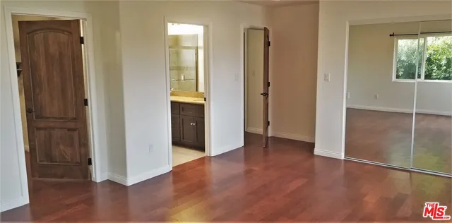 a bathroom with a sink double vanity and a bathtub