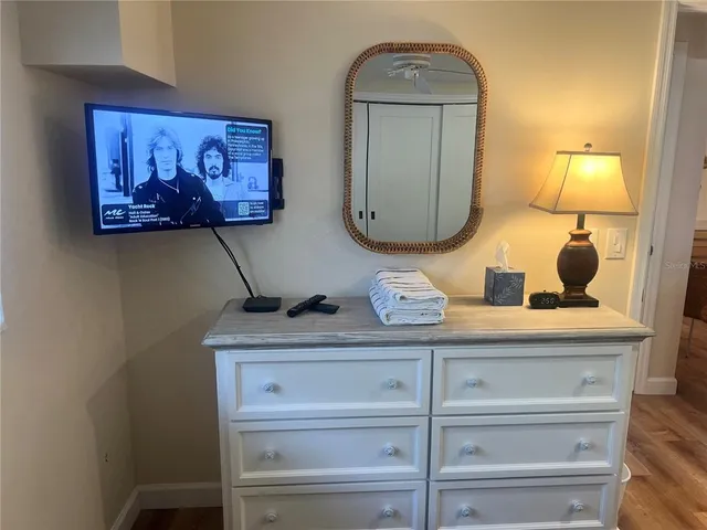 a bathroom with a mirror and a sink