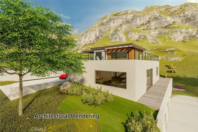 a view of a house with a yard