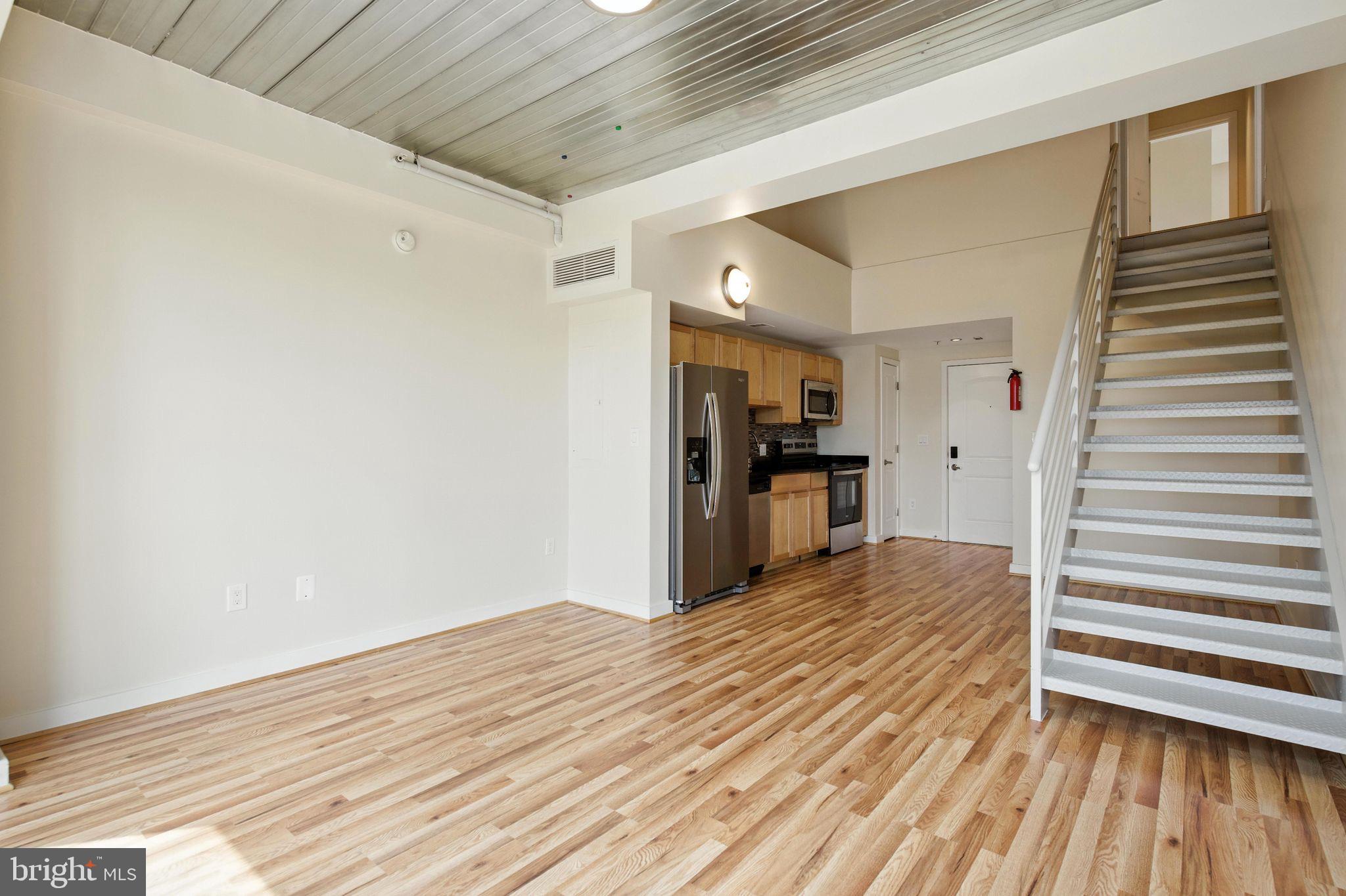 5885 Colorado Avenue Northwest, Unit 208 Washington, DC 20011 - Photo 11 of 27 a view of empty room with wooden floor