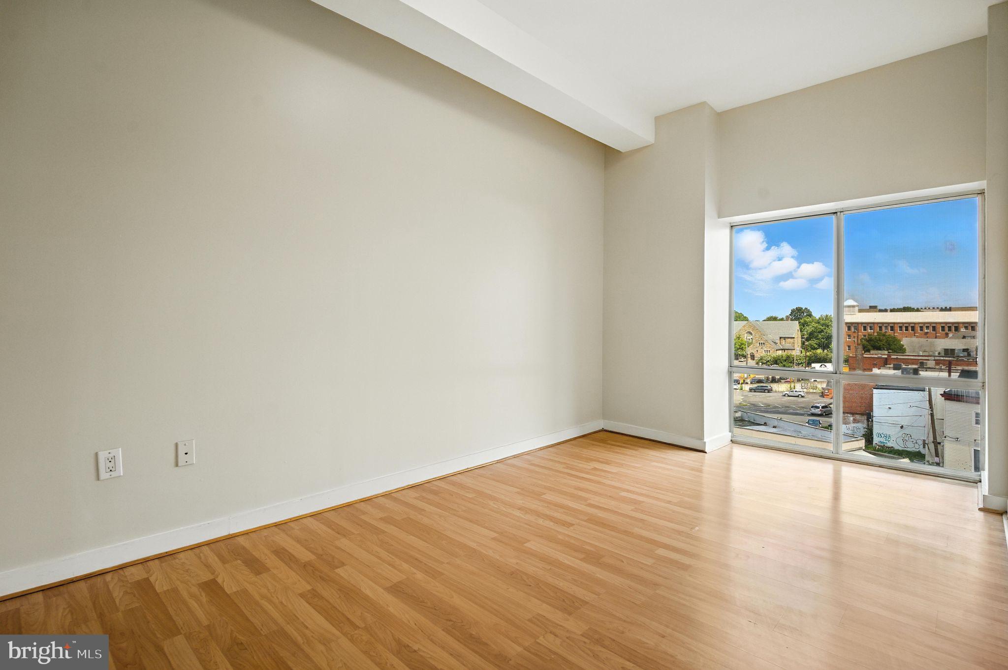 5885 Colorado Avenue Northwest, Unit 208 Washington, DC 20011 - Photo 24 of 27 a view of a kitchen with wooden floor