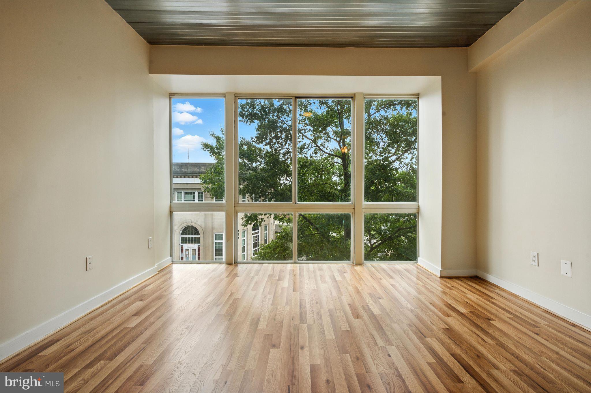 5885 Colorado Avenue Northwest, Unit 208 Washington, DC 20011 - Photo 7 of 27 a view of balcony with wooden floor