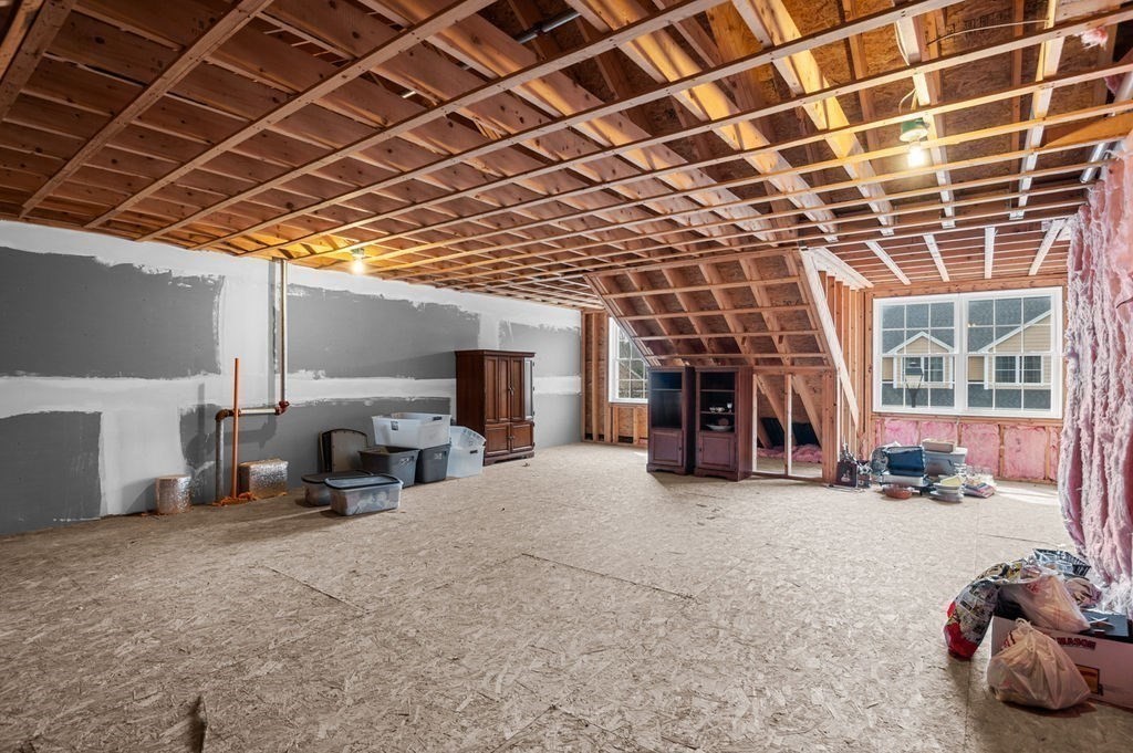 13 Freedom Way, Unit 13 Merrimac, MA 01860 - Photo 20 of 26 a view of a room with gym equipment