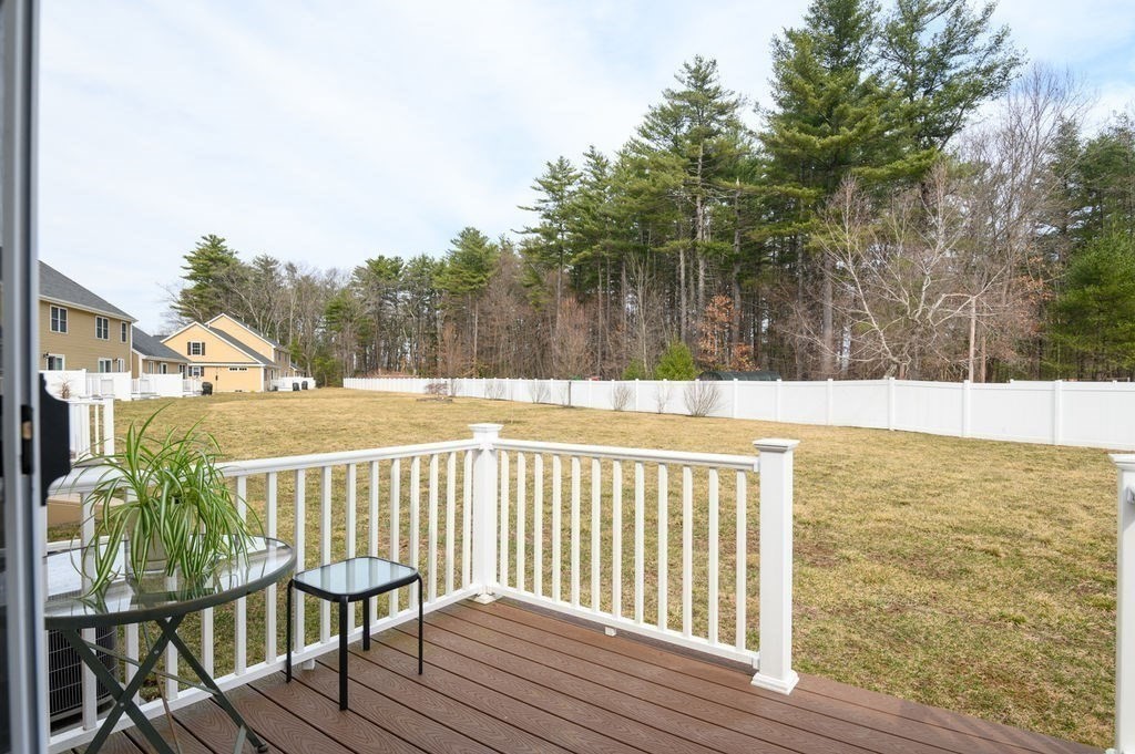 13 Freedom Way, Unit 13 Merrimac, MA 01860 - Photo 23 of 26 a view of balcony with wooden floor and seating space
