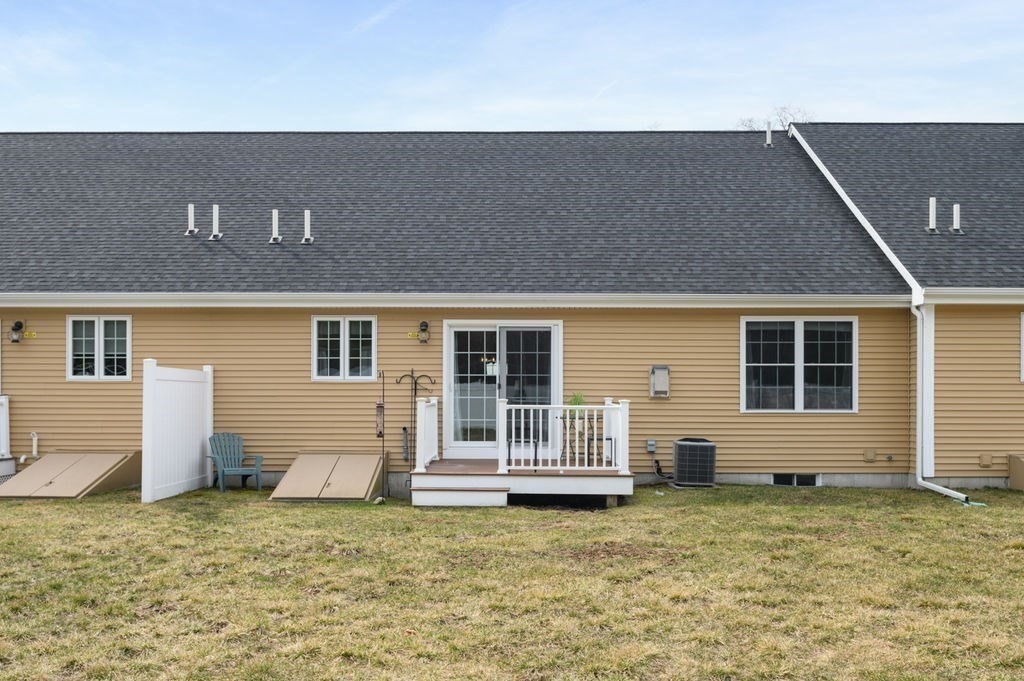 13 Freedom Way, Unit 13 Merrimac, MA 01860 - Photo 25 of 26 front view of a house with a yard