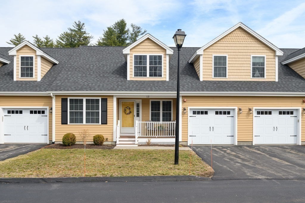 13 Freedom Way, Unit 13 Merrimac, MA 01860 - Photo 26 of 26 a front view of a house with garden