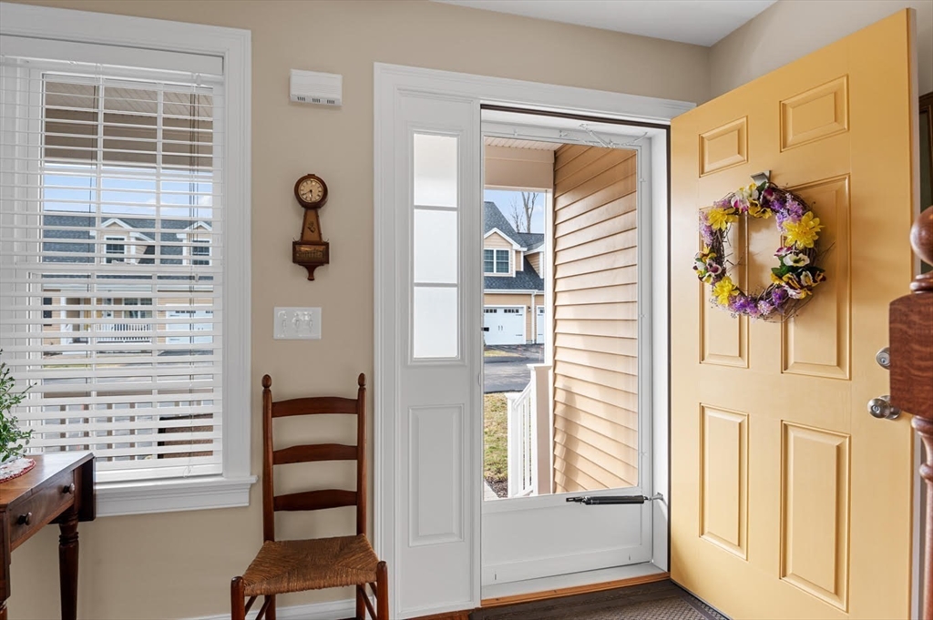 13 Freedom Way, Unit 13 Merrimac, MA 01860 - Photo 4 of 26 a view of wooden floor and windows in a room