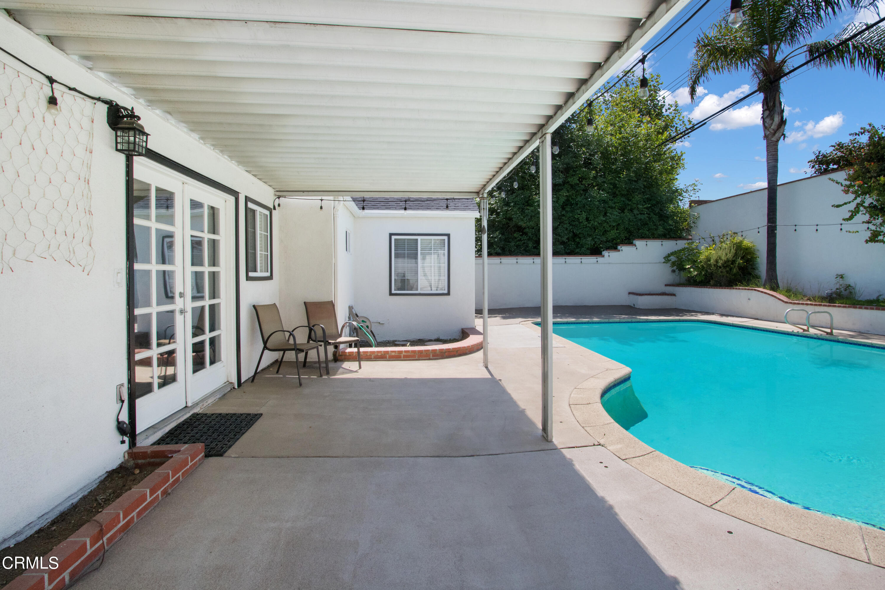 1029 Cynthia Avenue Pasadena, CA 91107 - Photo 17 of 19 a view of a patio with couches chairs and potted plants
