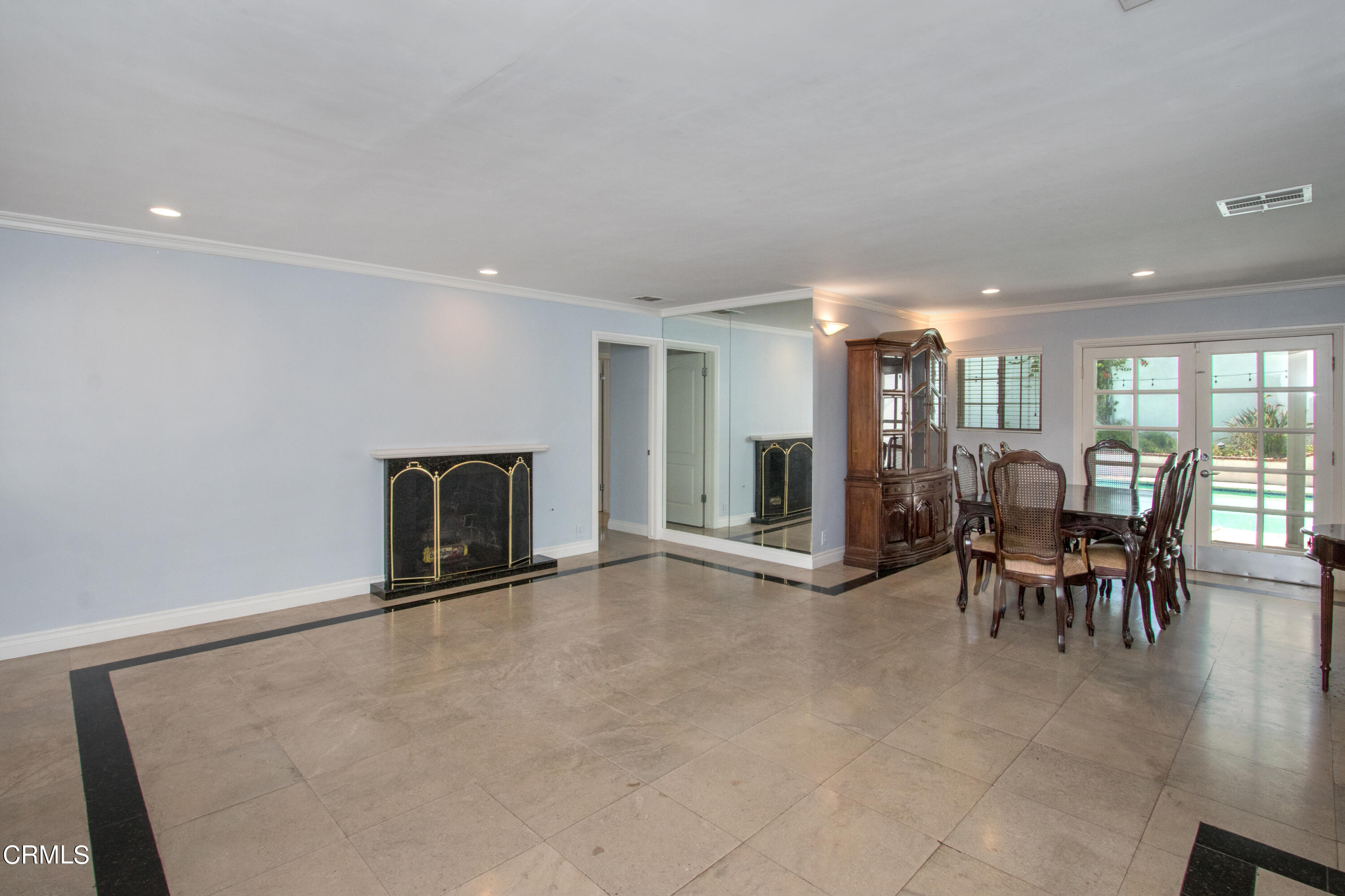 1029 Cynthia Avenue Pasadena, CA 91107 - Photo 3 of 19 an empty room with furniture and a fireplace