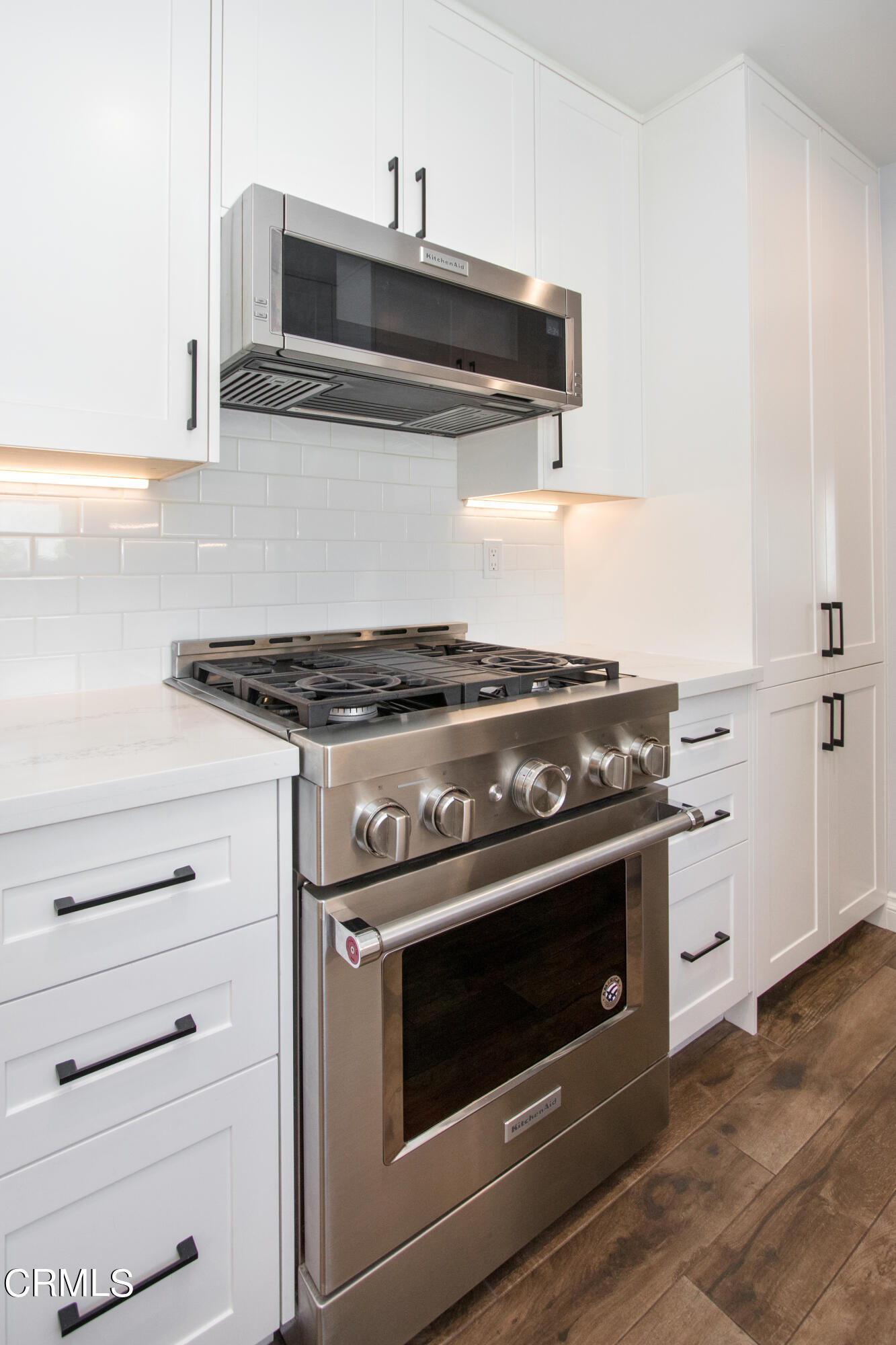 1029 Cynthia Avenue Pasadena, CA 91107 - Photo 8 of 19 a stove top oven sitting inside of a kitchen