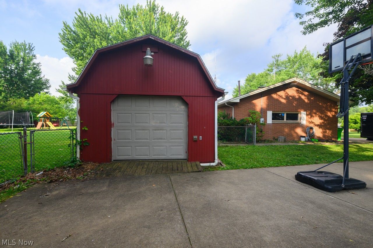 3912 Rolling Ridge Road Northeast Canton, OH 44721 - Photo 24 of 33 Storage barn that is 24 x 14 with electric