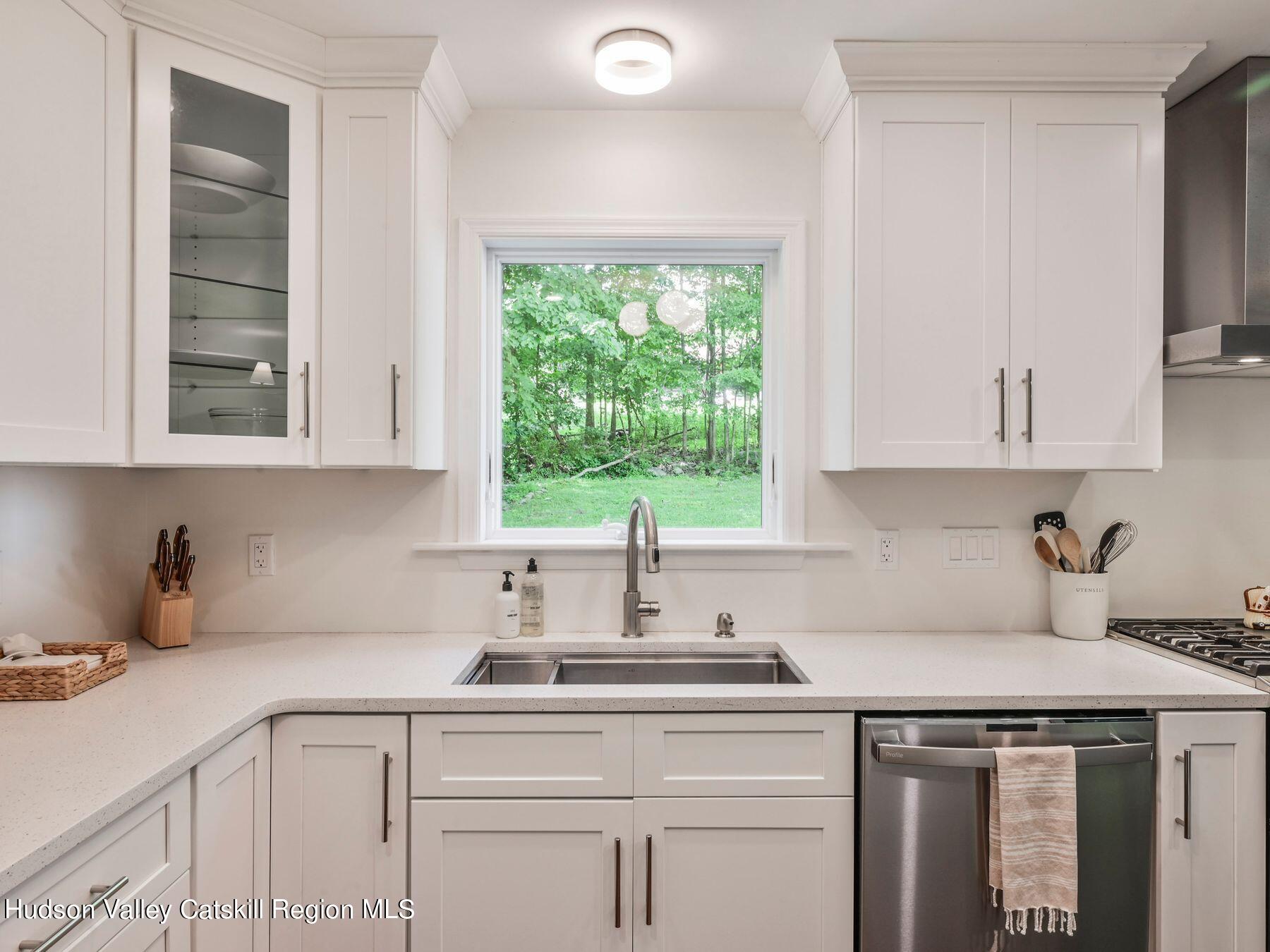 14 Red Maple Road Shokan, NY 12481 - Photo 12 of 34 a kitchen with appliances cabinets and a window