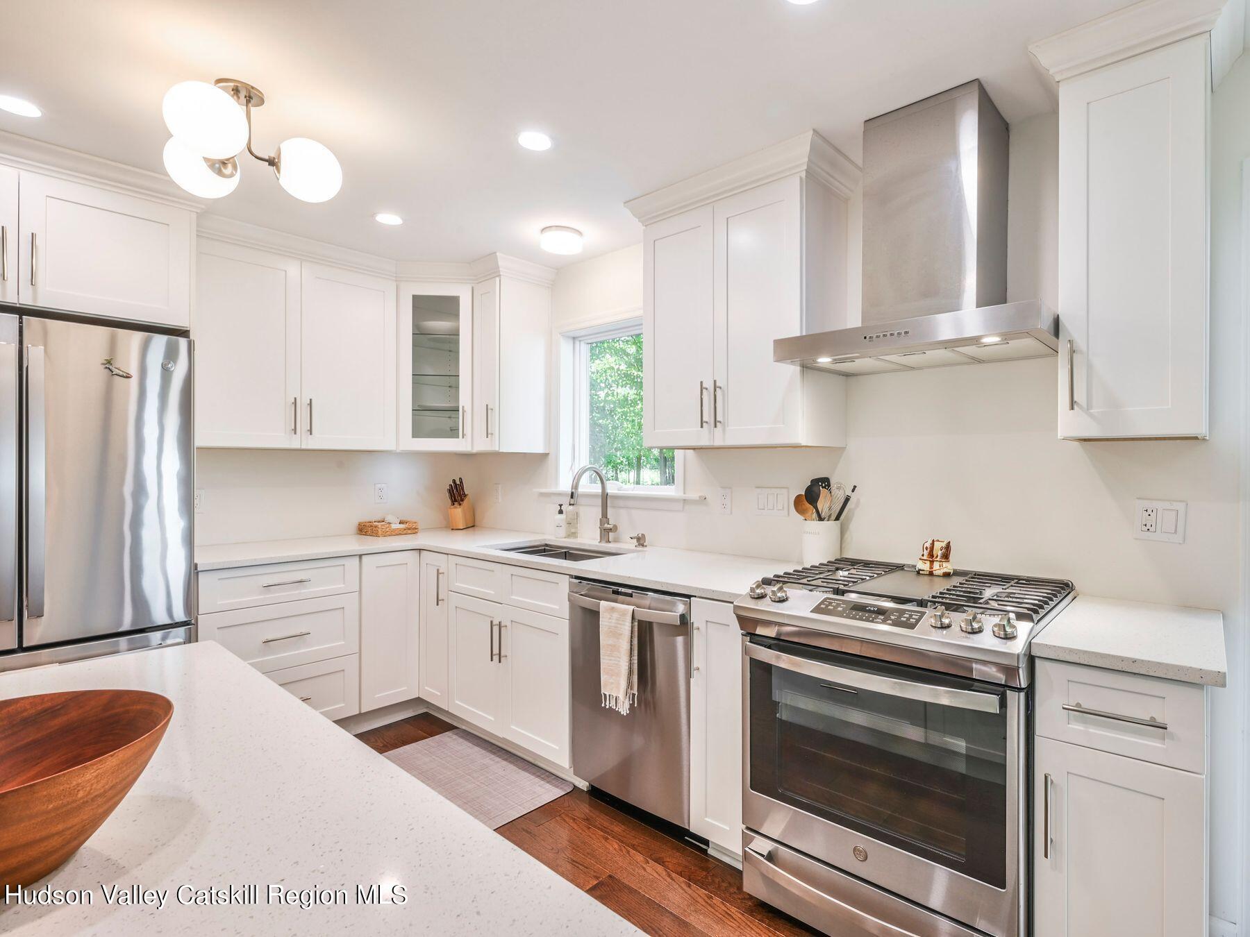 14 Red Maple Road Shokan, NY 12481 - Photo 13 of 34 a kitchen with stainless steel appliances granite countertop a stove a sink and a refrigerator