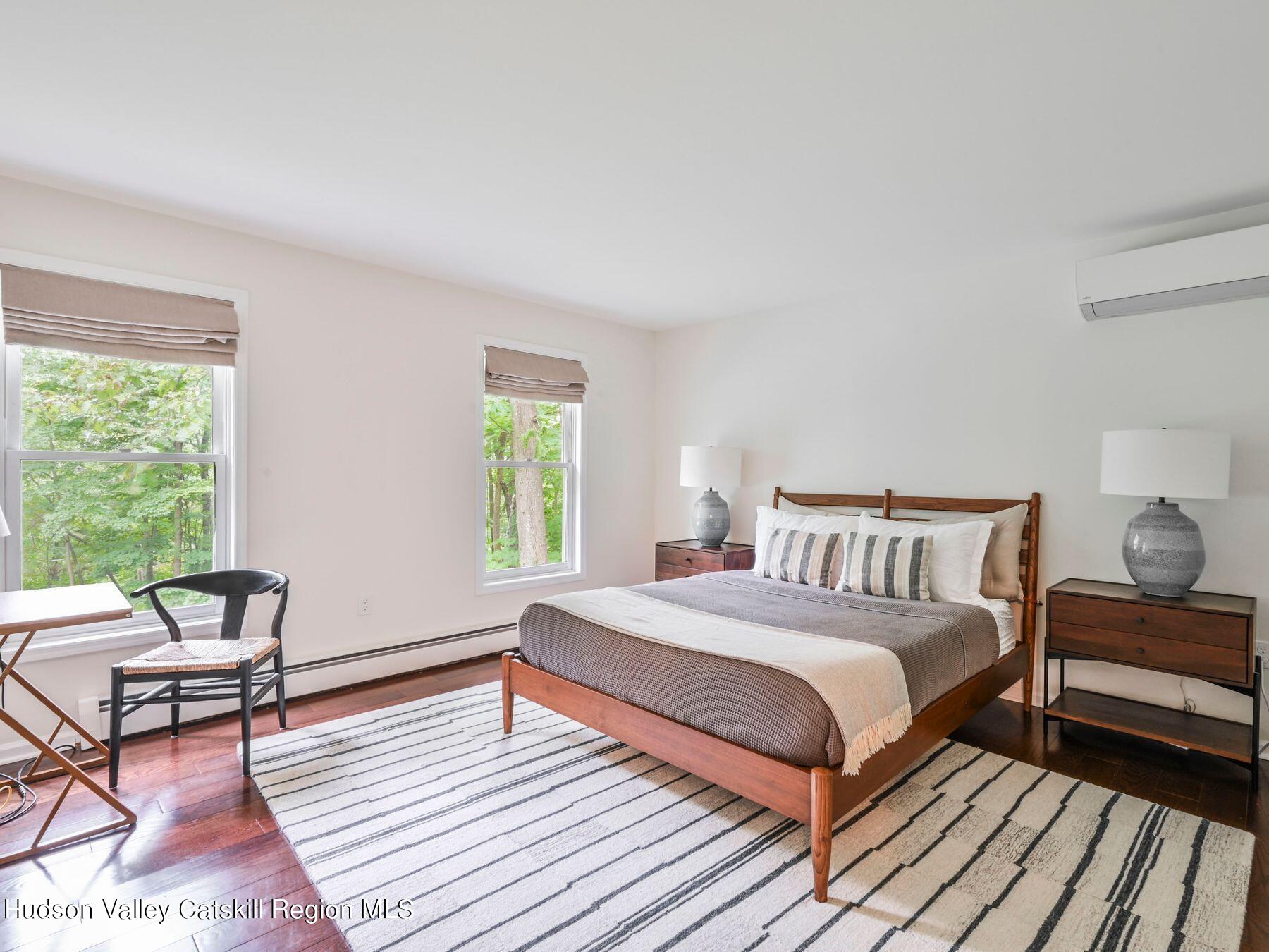 14 Red Maple Road Shokan, NY 12481 - Photo 17 of 34 a bed room with a bed and a chair