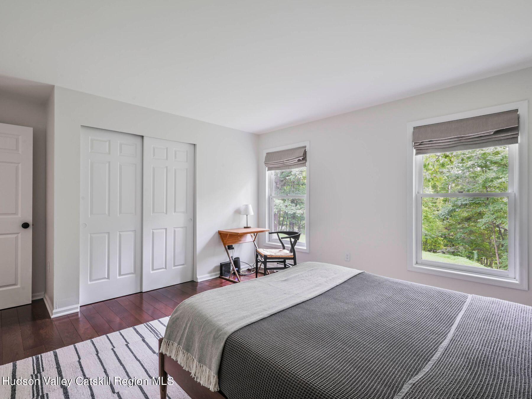 14 Red Maple Road Shokan, NY 12481 - Photo 18 of 34 a bedroom with a bed and a window
