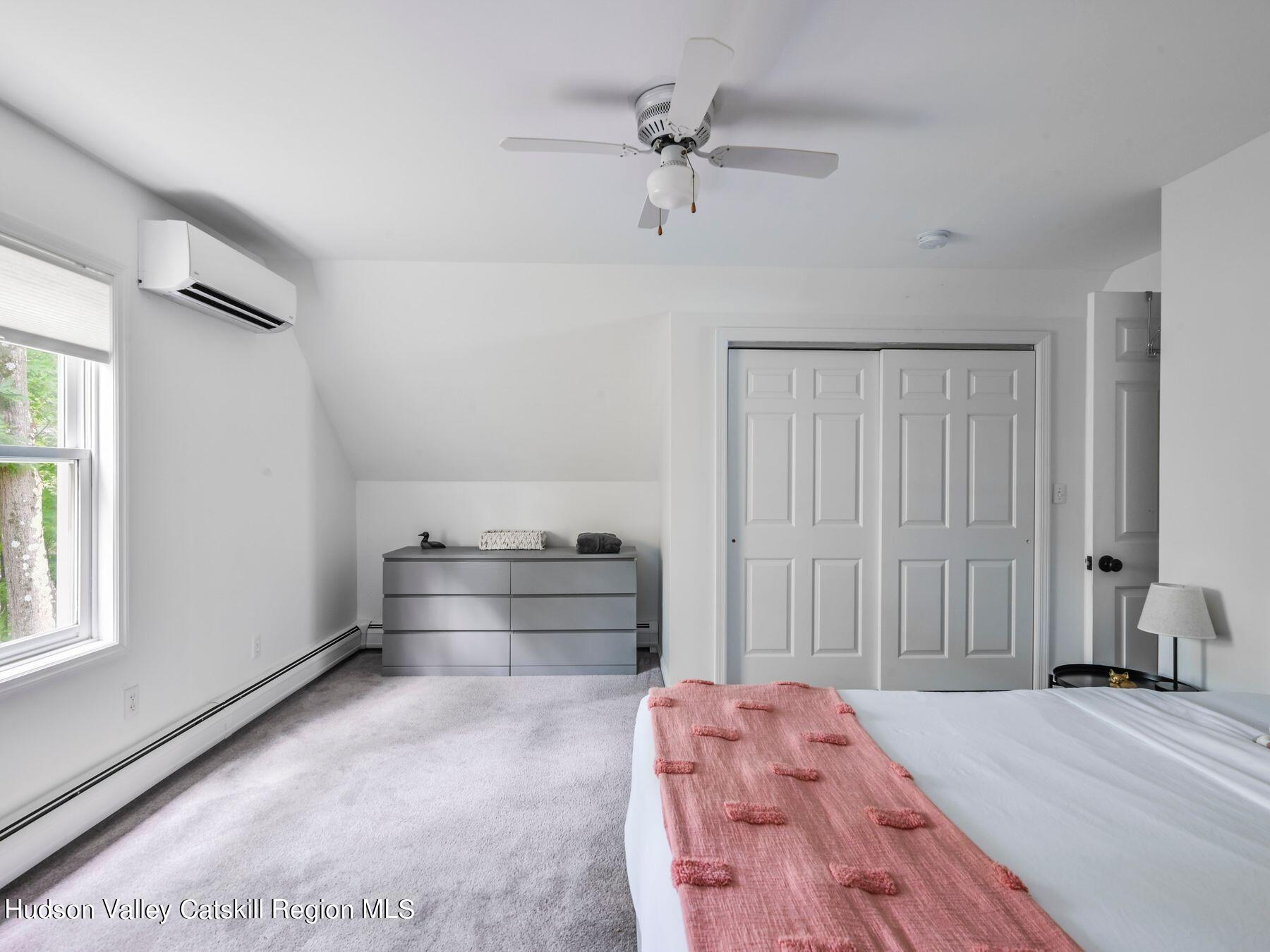 14 Red Maple Road Shokan, NY 12481 - Photo 22 of 34 a room with a bed and a window