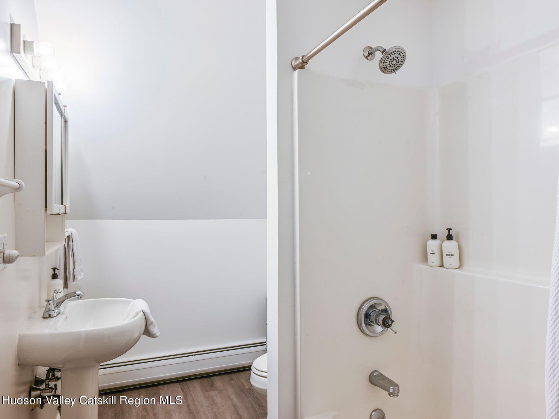 14 Red Maple Road Shokan, NY 12481 - Photo 24 of 34 a bathroom with a sink and mirror