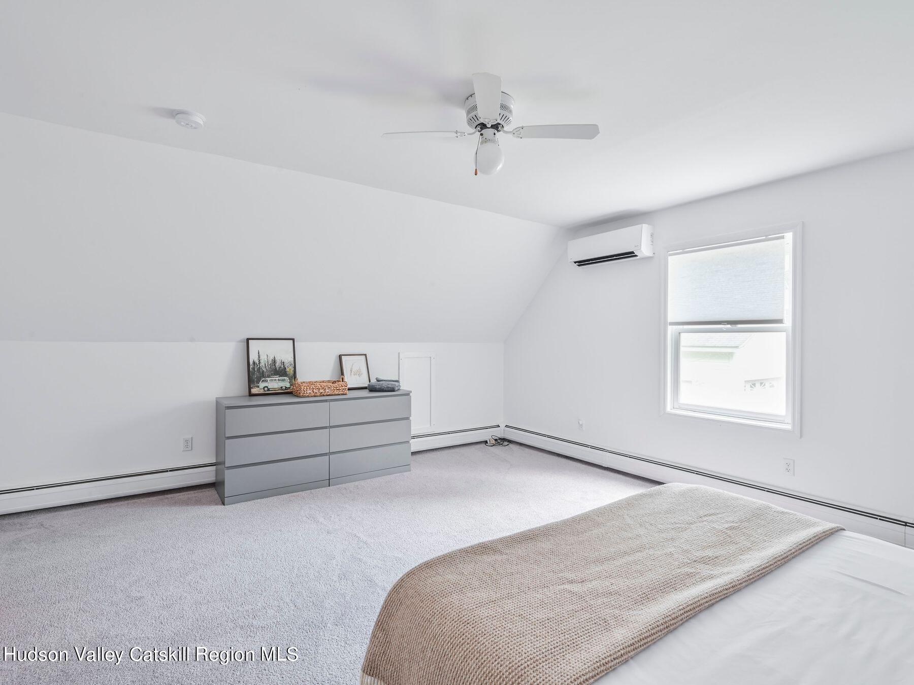 14 Red Maple Road Shokan, NY 12481 - Photo 26 of 34 a bed room with a bed and a window