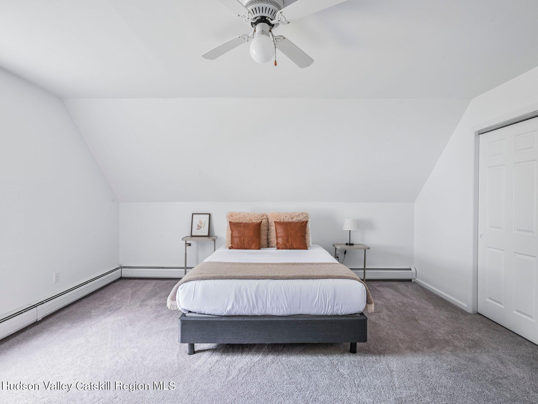 14 Red Maple Road Shokan, NY 12481 - Photo 27 of 34 a bedroom with a bed and a window