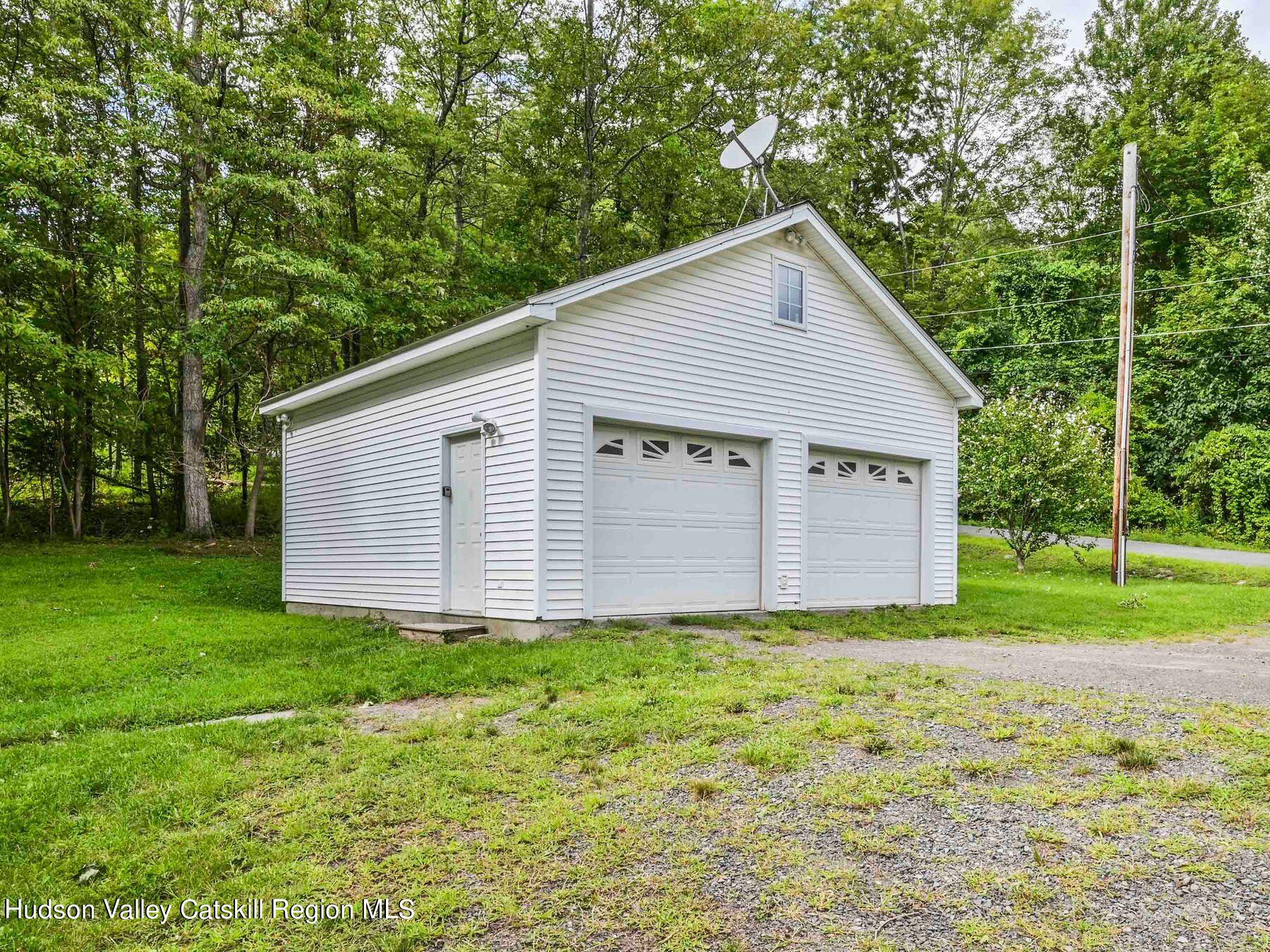 14 Red Maple Road Shokan, NY 12481 - Photo 33 of 34 a view of a house with yard and a garden