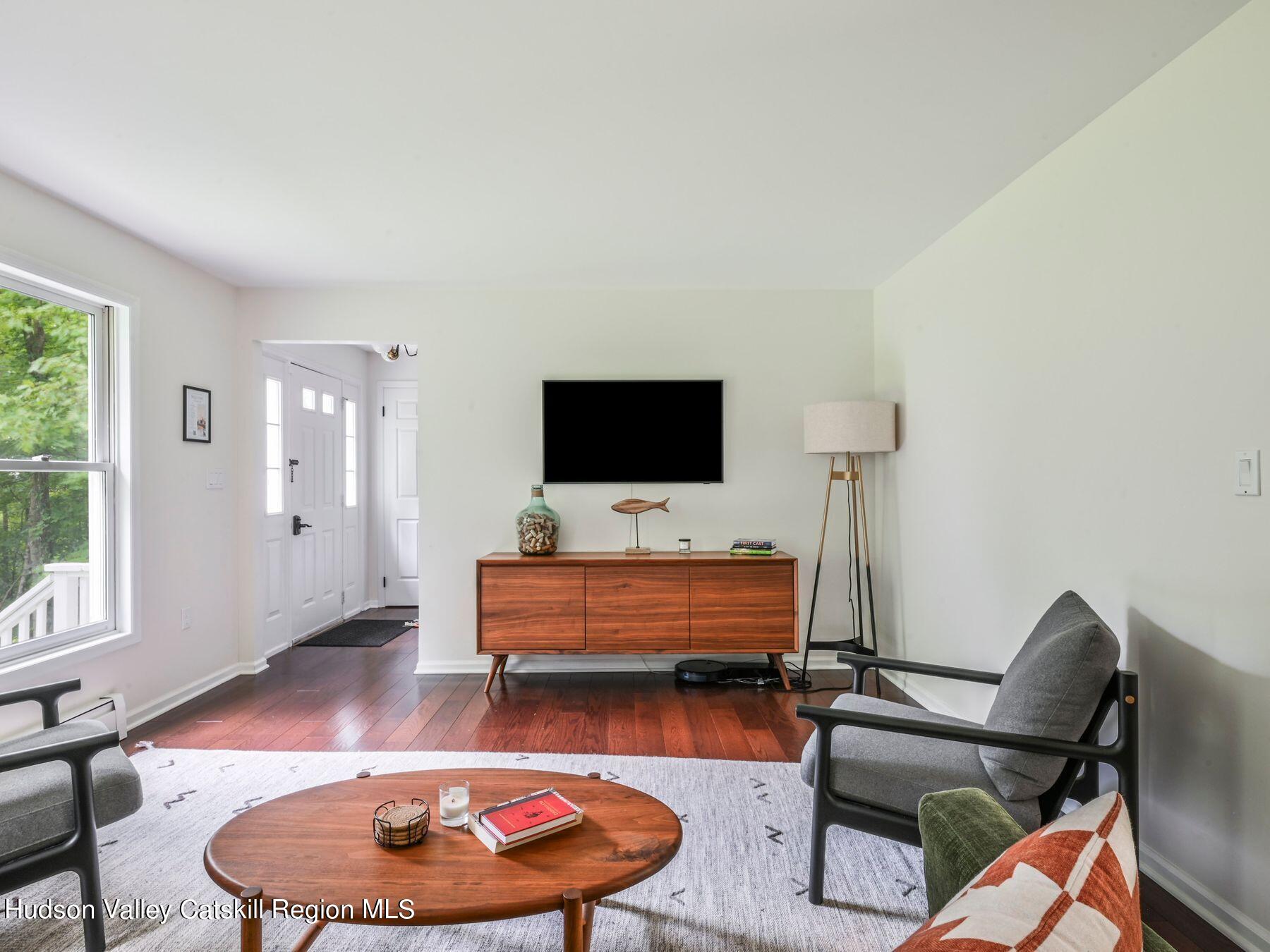 14 Red Maple Road Shokan, NY 12481 - Photo 8 of 34 a living room with furniture and a flat screen tv