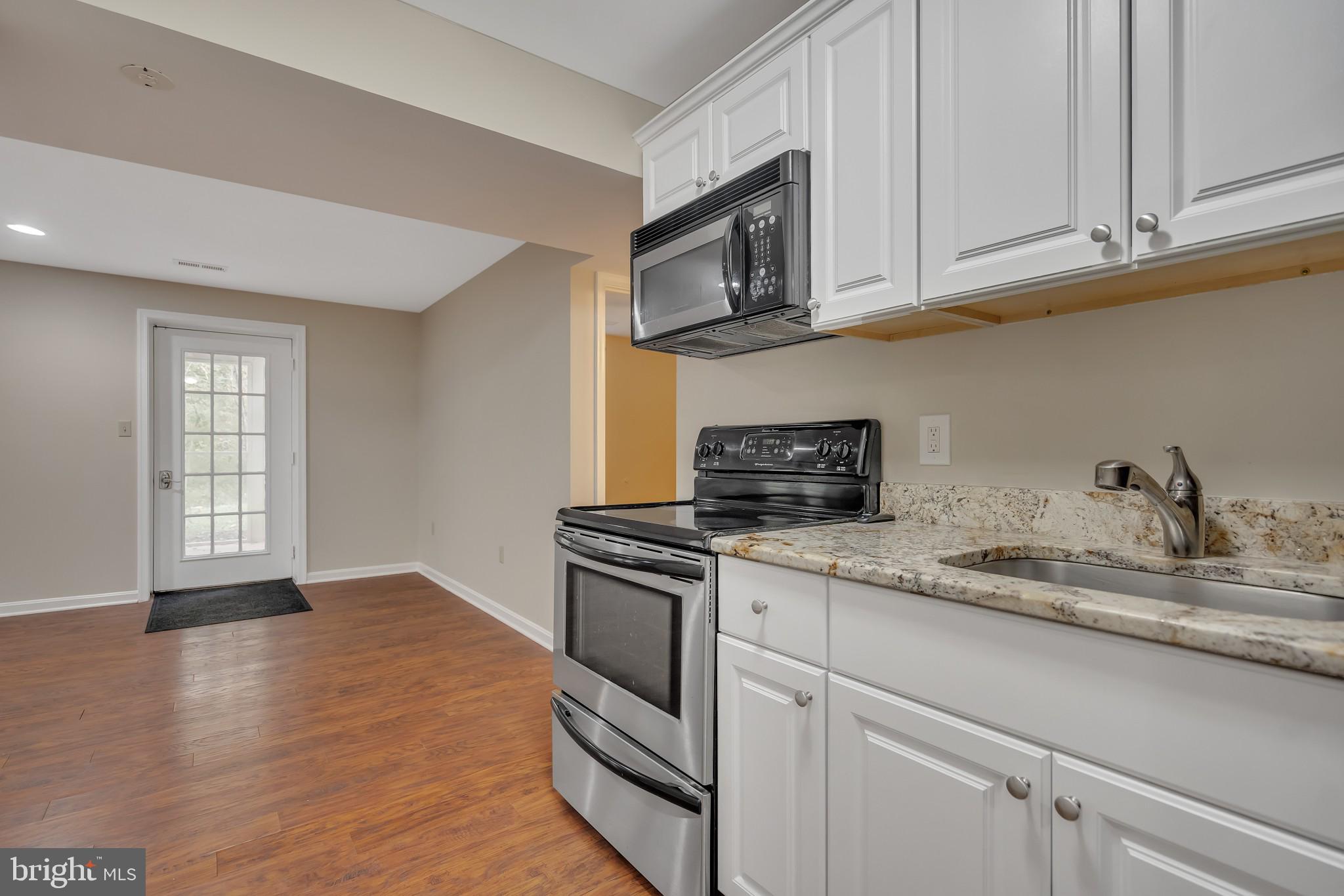7029 Highbridge Road Bowie, MD 20720 - Photo 34 of 47 In-Law Kitchen in basement