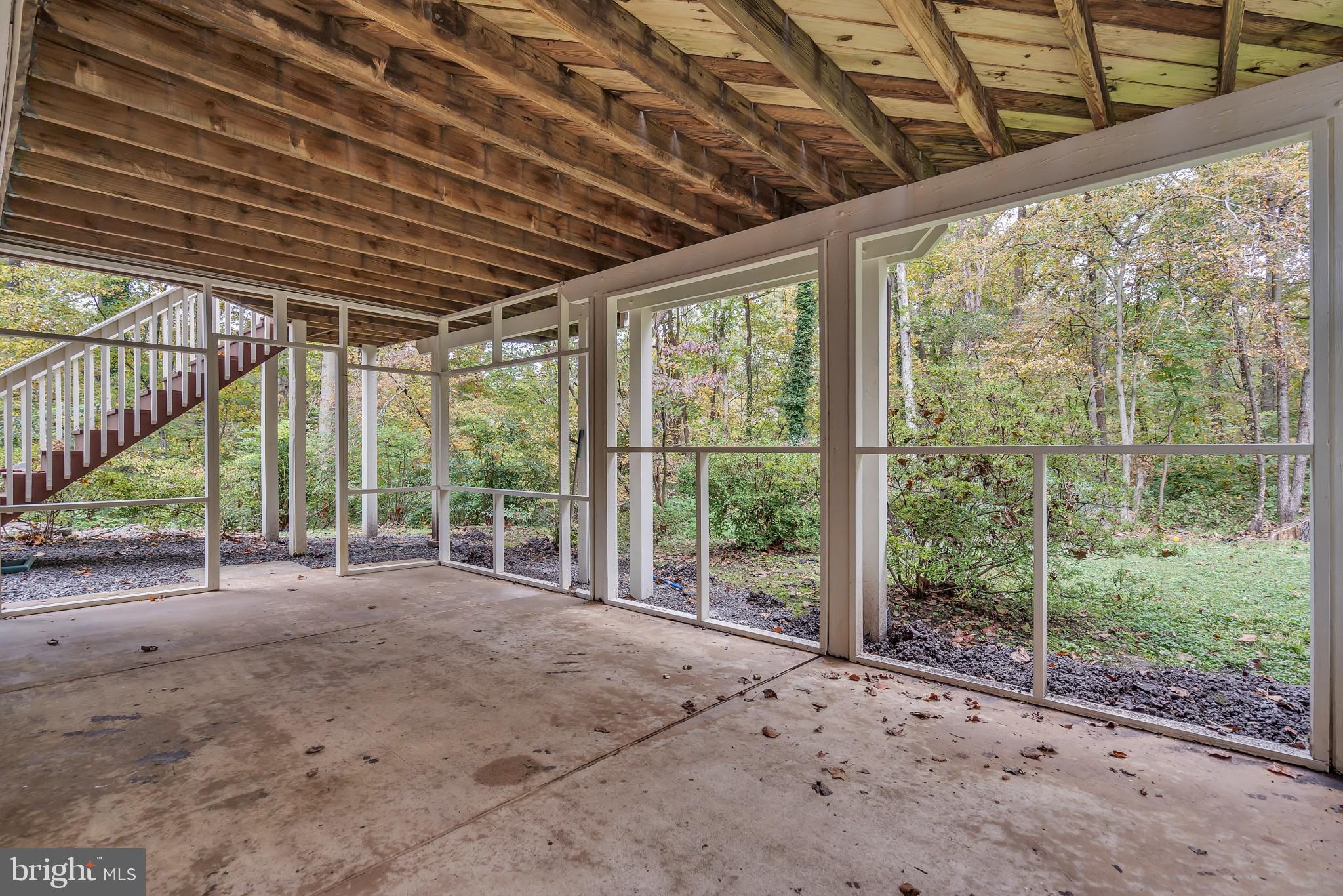 7029 Highbridge Road Bowie, MD 20720 - Photo 39 of 47 Screened in under deck patio