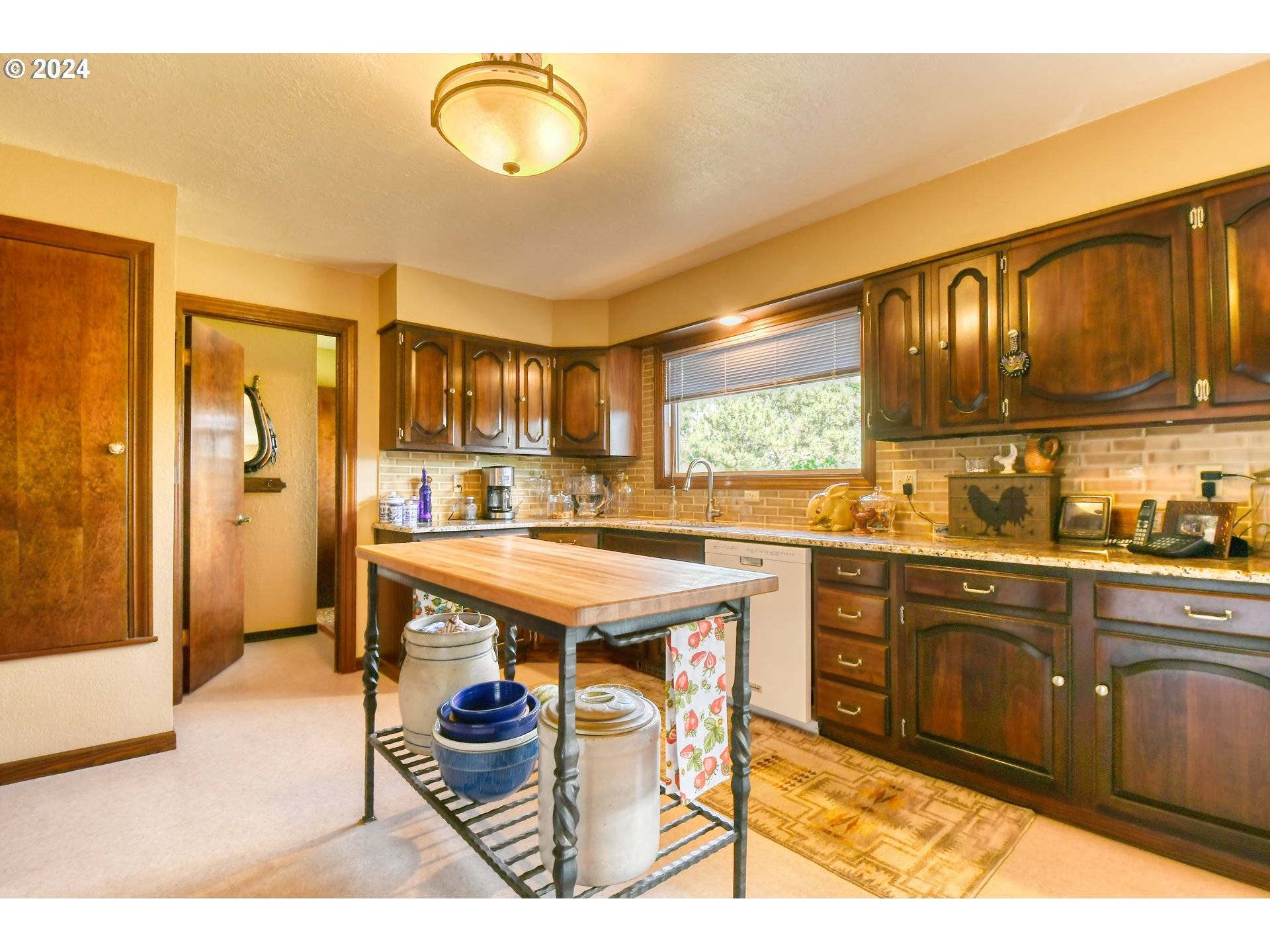 75468 McCormmach Road Pendleton, OR 97801 - Photo 13 of 48 a kitchen with a refrigerator and a sink