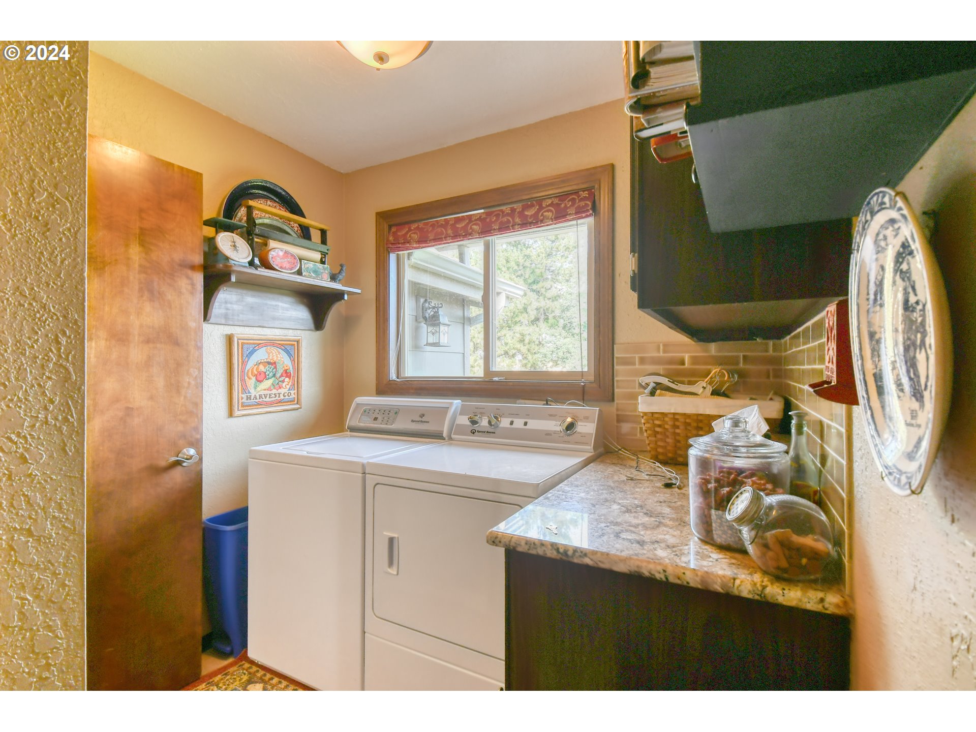 75468 McCormmach Road Pendleton, OR 97801 - Photo 24 of 48 a kitchen with a sink and a refrigerator