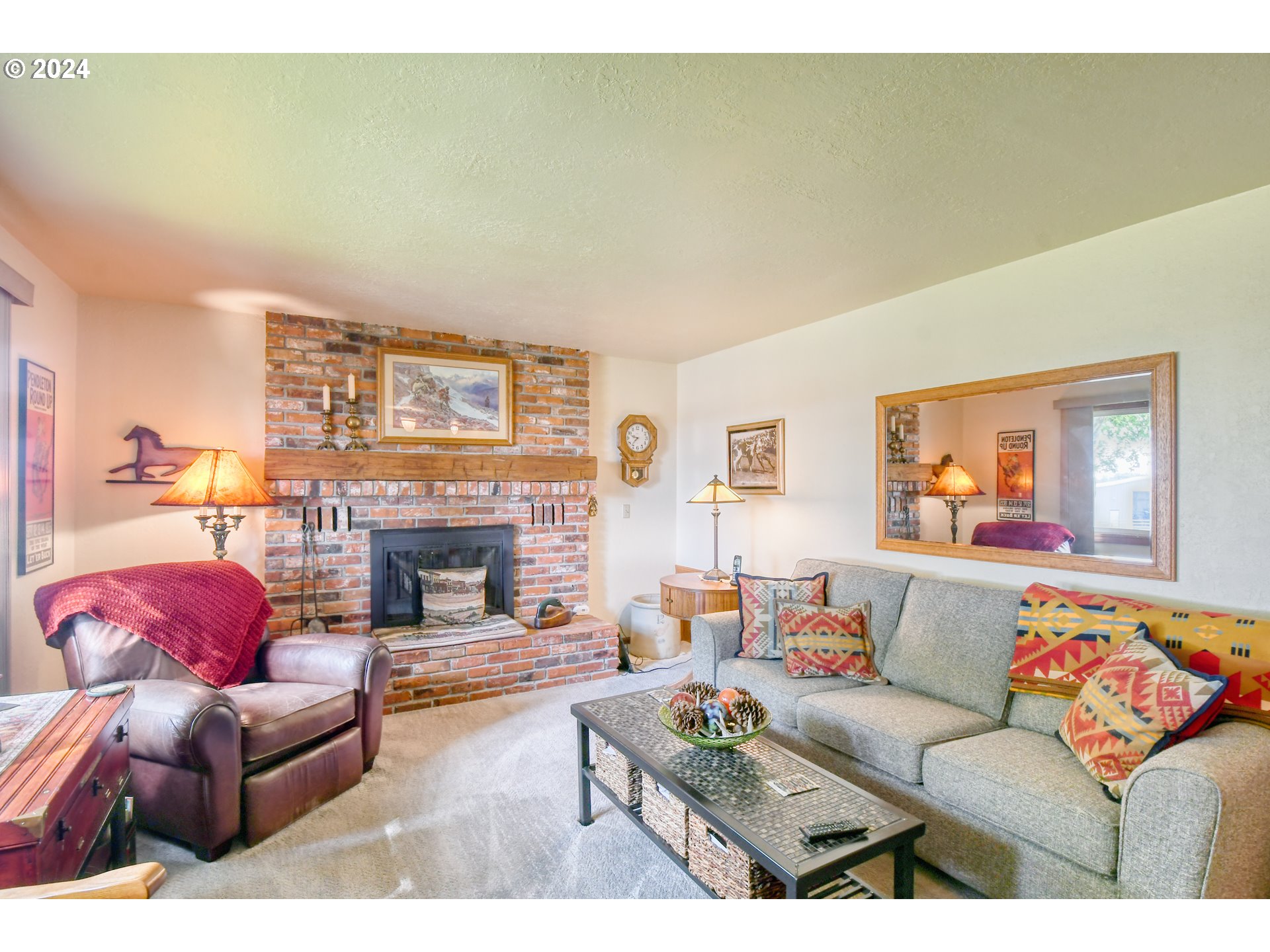 75468 McCormmach Road Pendleton, OR 97801 - Photo 5 of 48 a living room with furniture and a fireplace