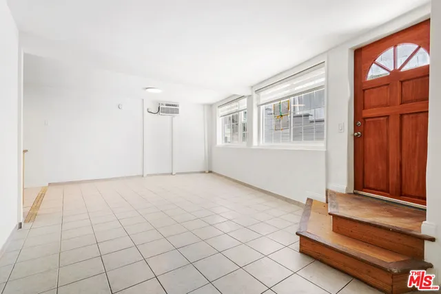 a view of a kitchen with a sink
