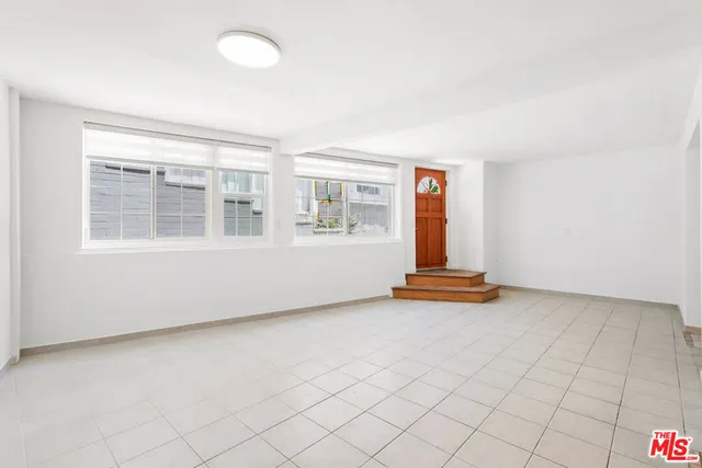 a kitchen with a stove and a microwave